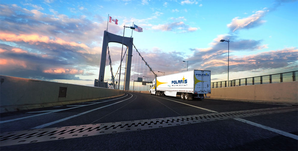 Polaris semi-trailer driving on international Canada/U.S. bridge