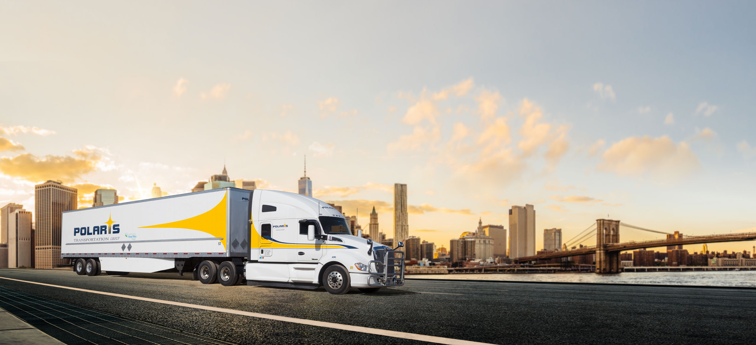 Polaris semi-trailer driving in front of cityscape 