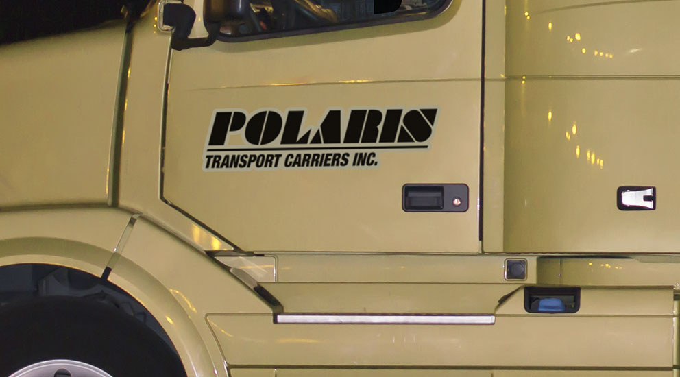 Closeup of vintage Polaris Transport Carriers Inc. truck side door 